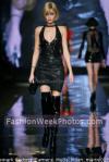 short black skirt and high black boots